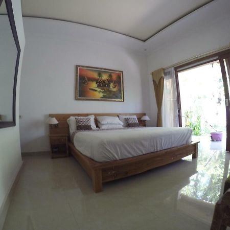 Rumah Made Amed Esterno foto