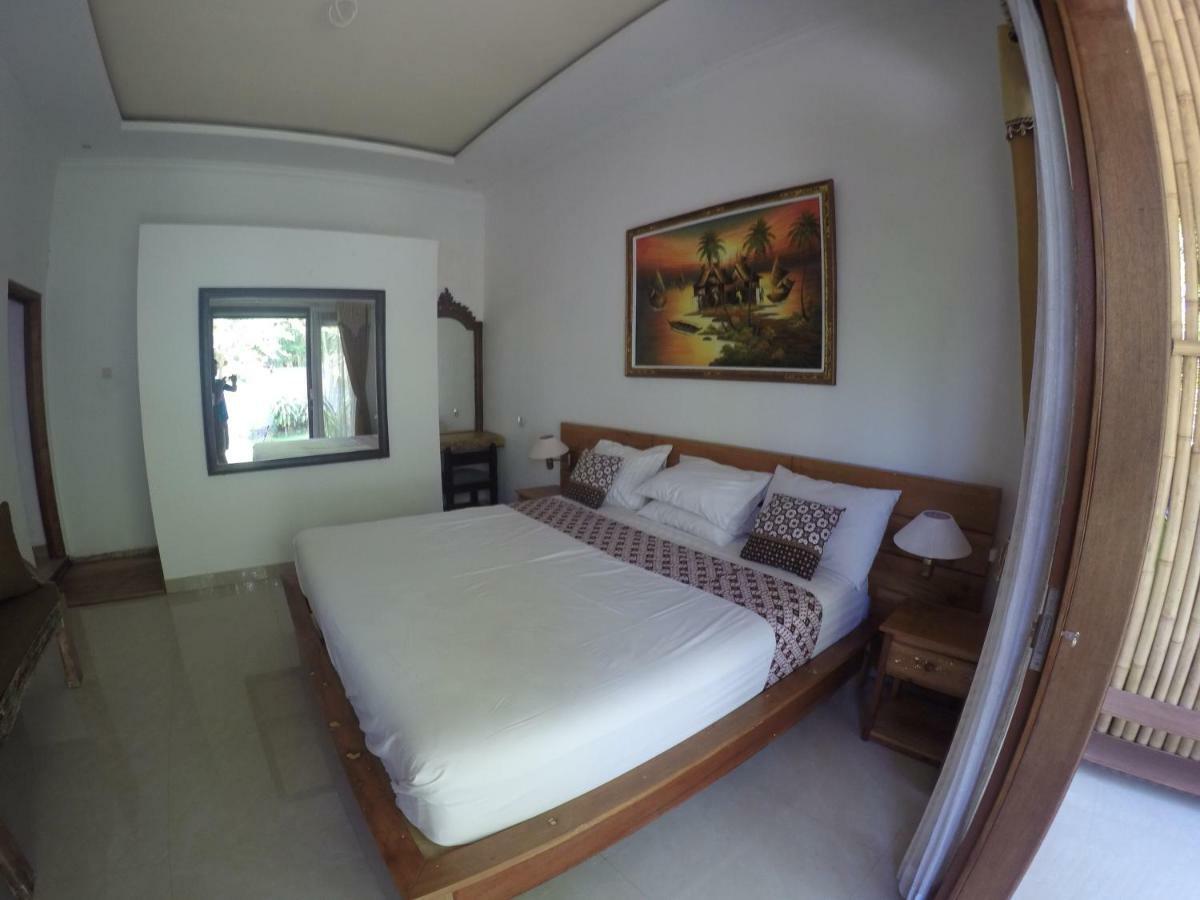 Rumah Made Amed Esterno foto